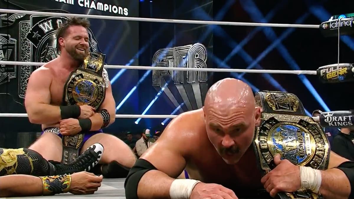 FTR celebrating with AEW World Tag Team Titles at Full Gear 2025