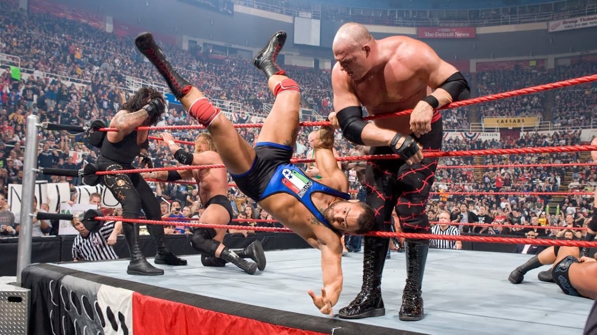 Santino Marella tumbling to the floor as Kane watches on at Royal Rumble 2009
