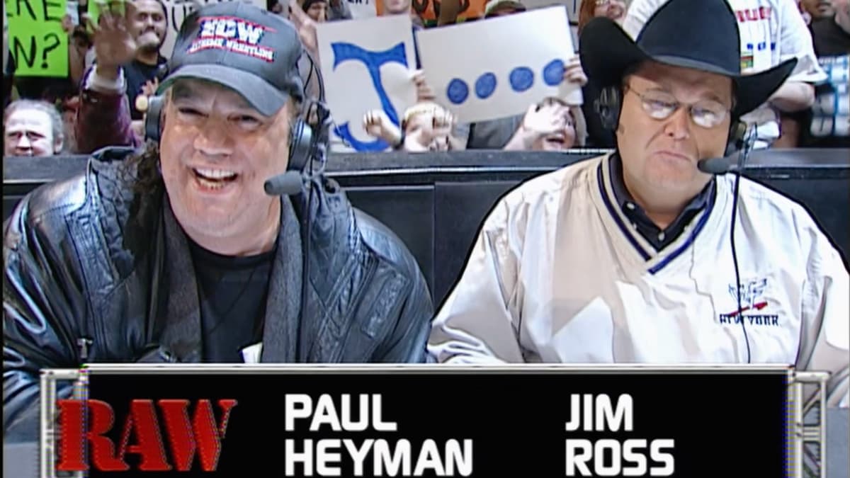 Paul Heyman sitting alongside Jim Ross at the WWE commentary table