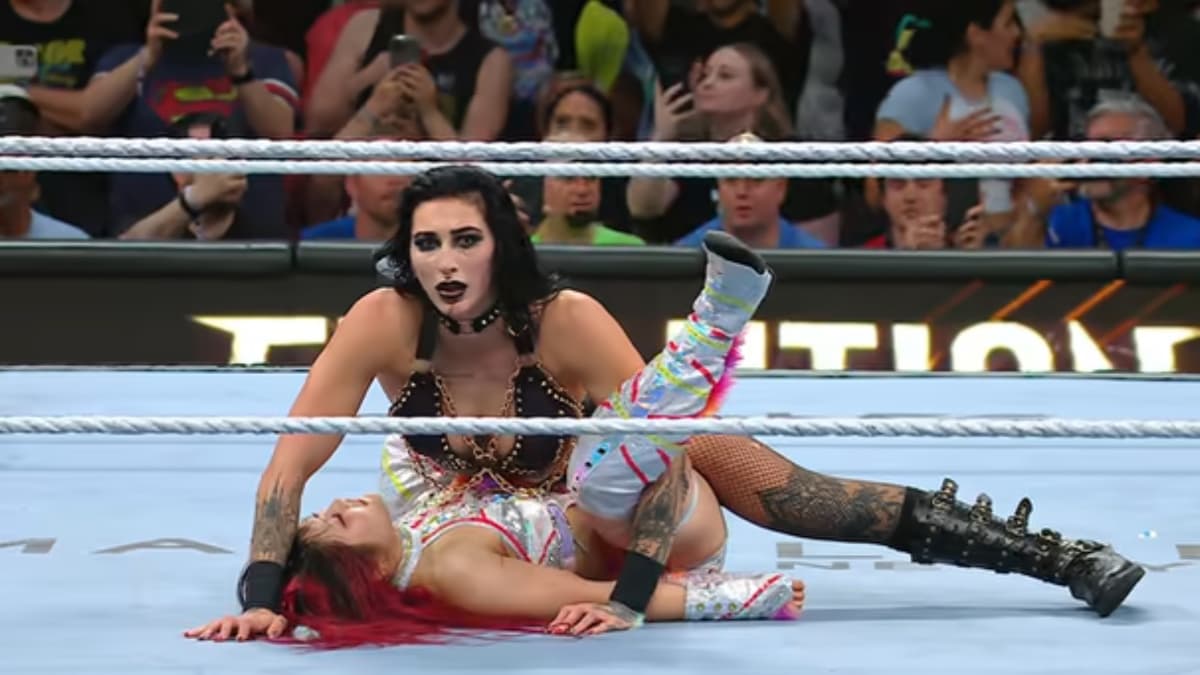 Rhea Ripley pinning IYO SKY while between her legs