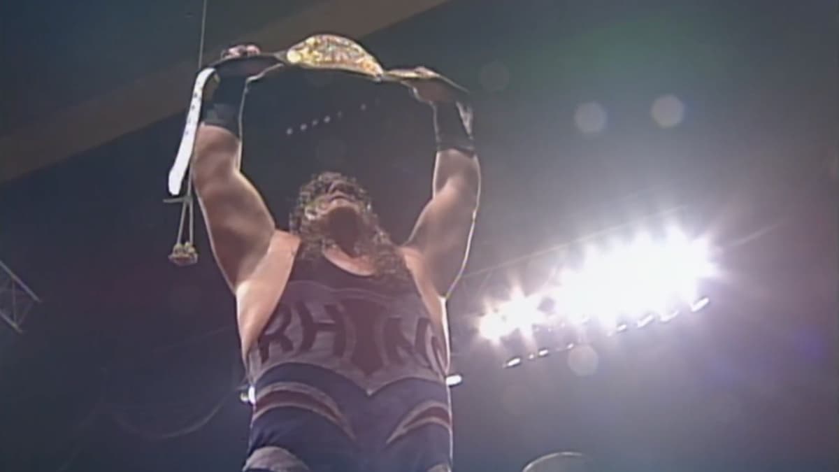 Rhino holding up the ECW World Heavyweight Title
