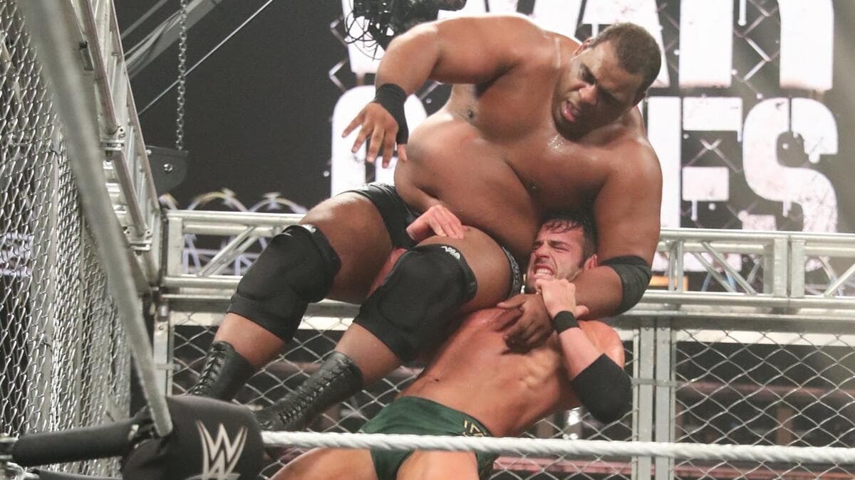 Roderick Strong hitting Keith Lee with an Olympic Slam from the top turnbuckle in NXT WarGames in 2019