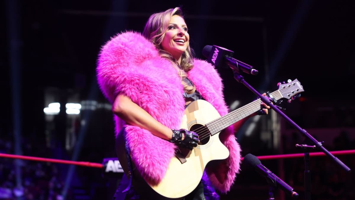 Harley Cameron playing the guitar in the ring