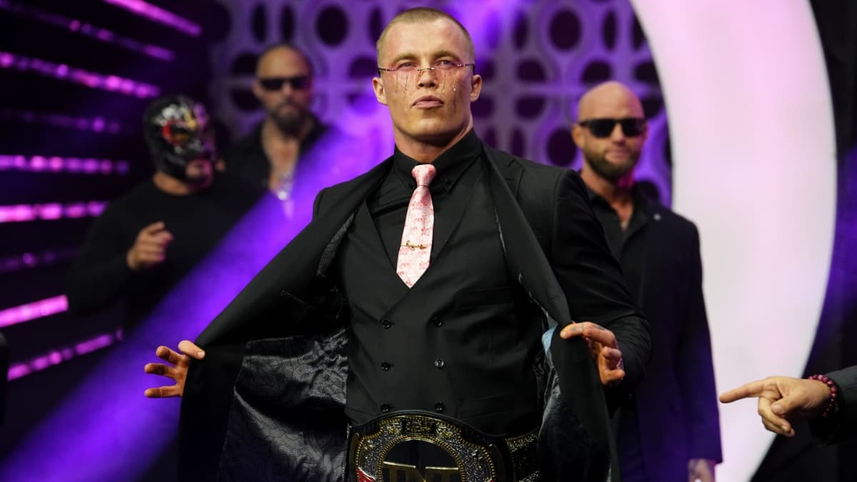 Kyle Fletcher as TNT Champion making his entrance