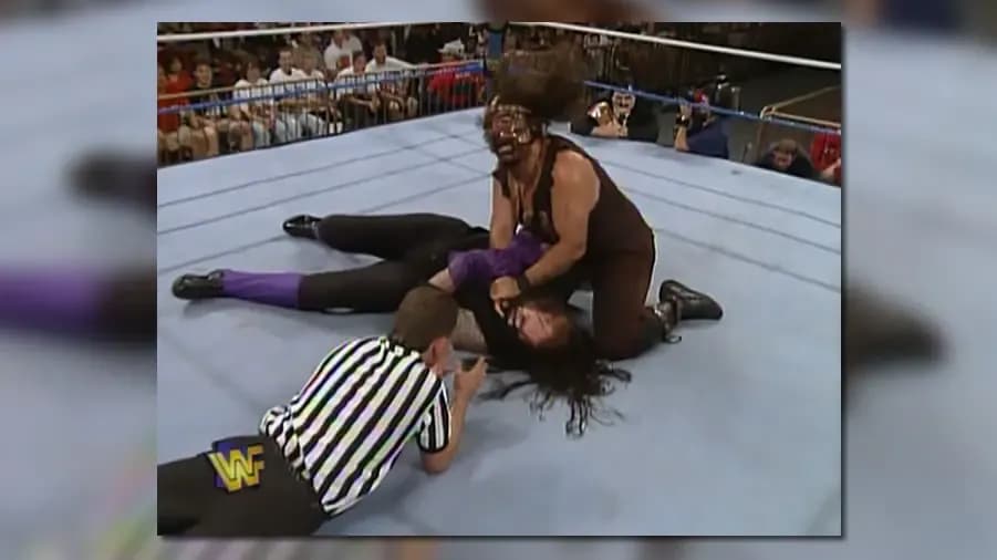 https://cultaholic.com/files/images/1dd0b431173e5e6312a04197605dff8b605f0e3f-the-undertaker-mankind-1.jpg