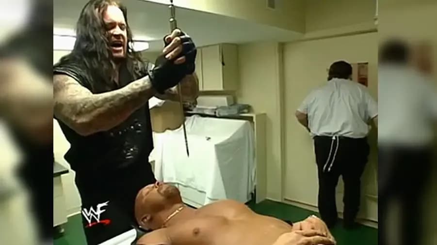 https://cultaholic.com/files/images/3d32305562ec0d4d8c3c718bb121f23606b1a3af-the-undertaker-stone-cold-steve-austin.jpg