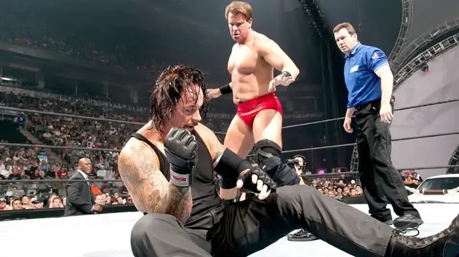 https://cultaholic.com/files/images/921e45396c13da39d8a2ffb5be69ad8e9a57140a-undertaker-jbl-summerslam-2004-1.jpg