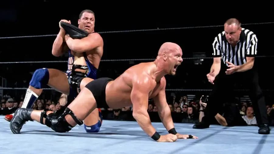 https://cultaholic.com/files/images/a00819dd969ba2b0f1cda99619bea854724d7ff4-STONE-COLD-STEVE-AUSTIN-KURT-ANGLE-SUMMERSLAM-2001.jpg