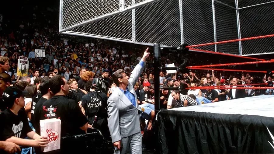 https://cultaholic.com/files/images/c4f6fc455734221404bb6e061f5b71ca2e2d6812-vince-mcmahon-king-of-the-ring-1998-hell-in-a-cell.jpg