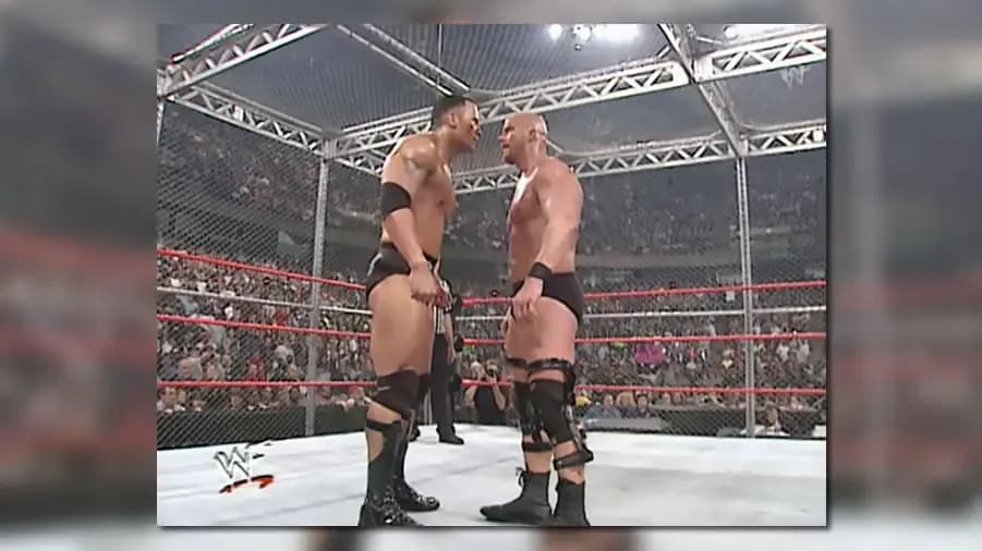 https://cultaholic.com/files/images/edc87f20f211fc8c4a71365c185c918798dc94ae-stone-cold-the-rock-armageddon-2000-hell-in-a-cell.jpg