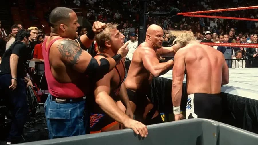 https://cultaholic.com/files/images/f592e553f364c5908333ce9389a6aded94aca493-savio-vega-stone-cold-owen-hart-billy-gunn-no-way-out-1998.jpg